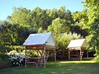 View of the tents and nature accommodations at Camping Seasonova in Maine-et-Loire